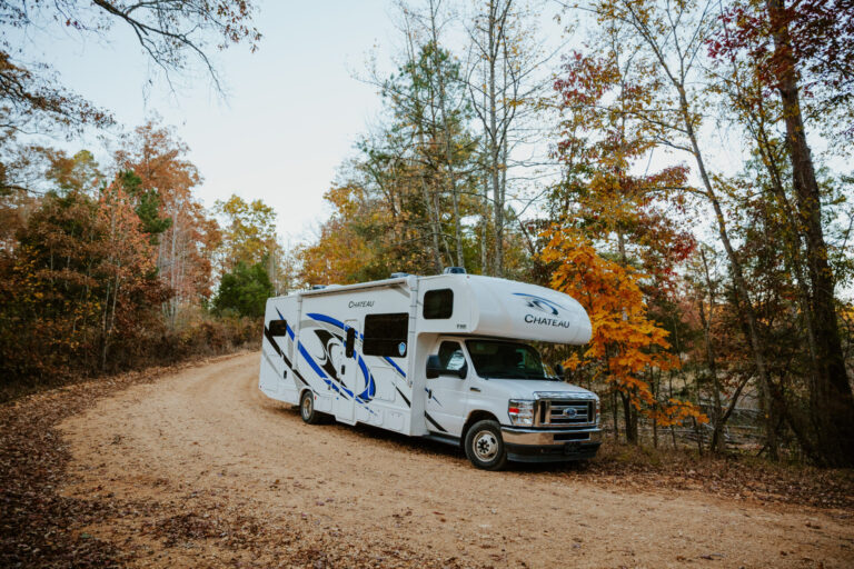 RV on the road during fall