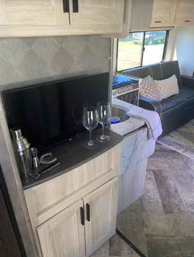 an RV bar with wineglasses