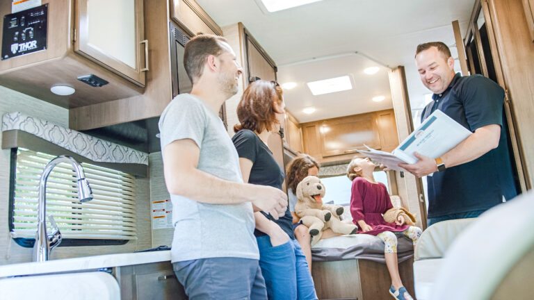 An RV owner showing renters paperwork