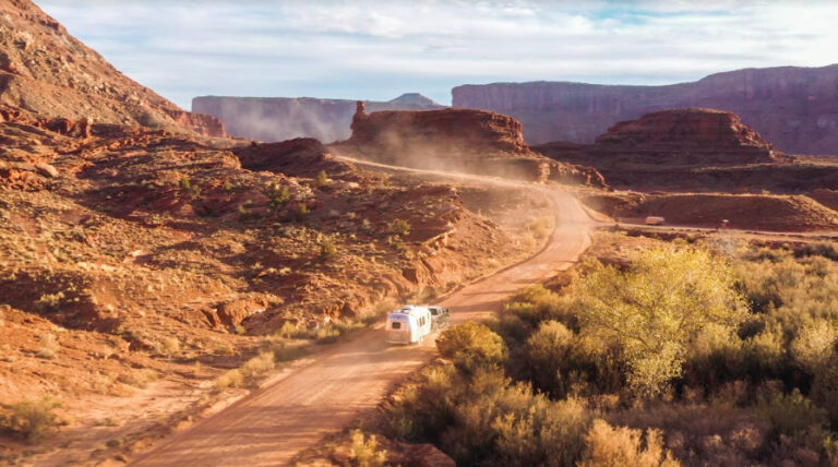 a truck pulling an Airstream trailer