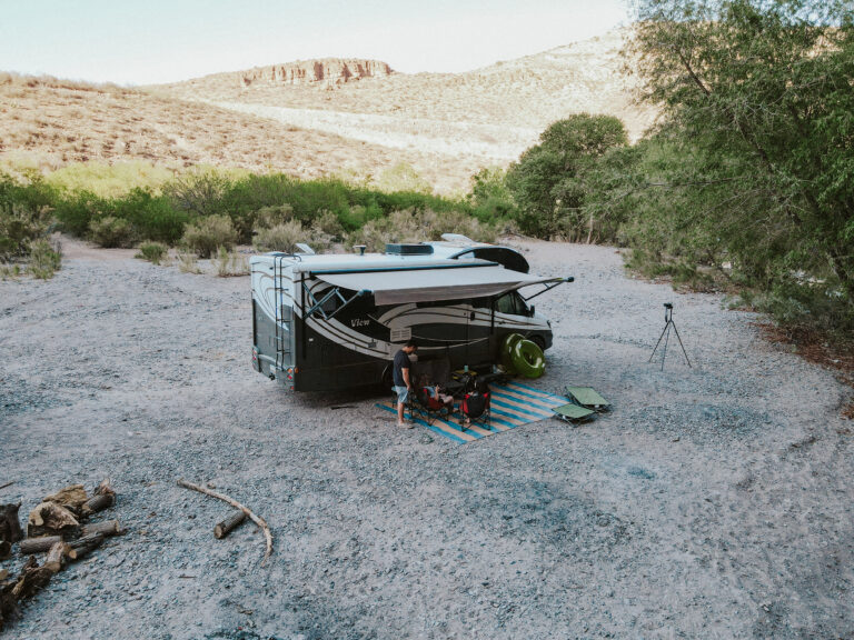 an RV set up at a desert campground