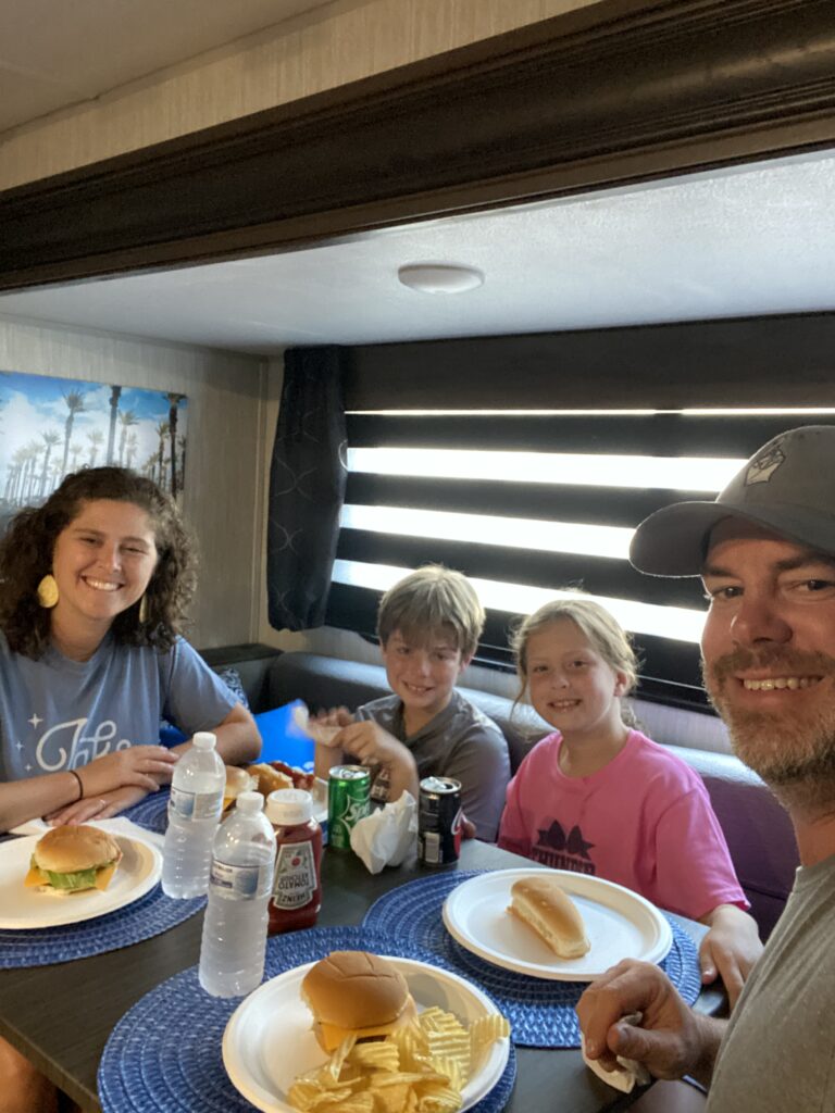 kids and parents eating in an RV