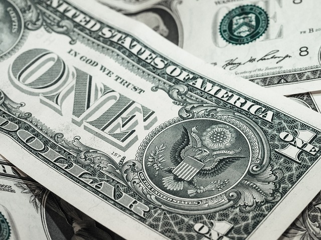 a close up shot of dollar bills