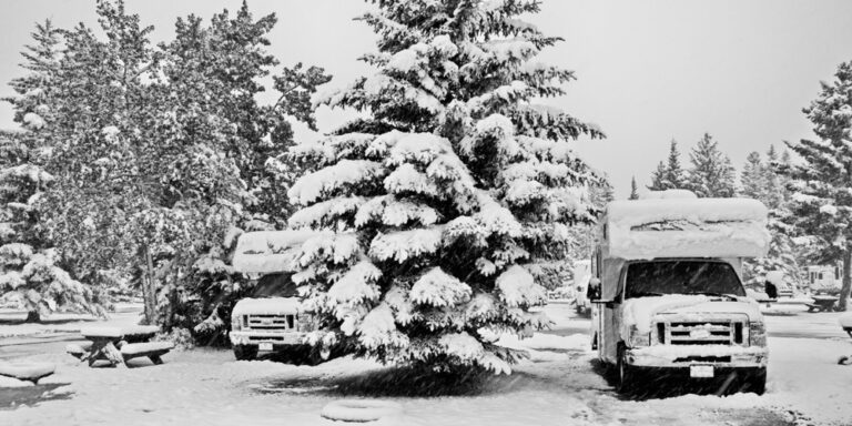 RVs covered in snow