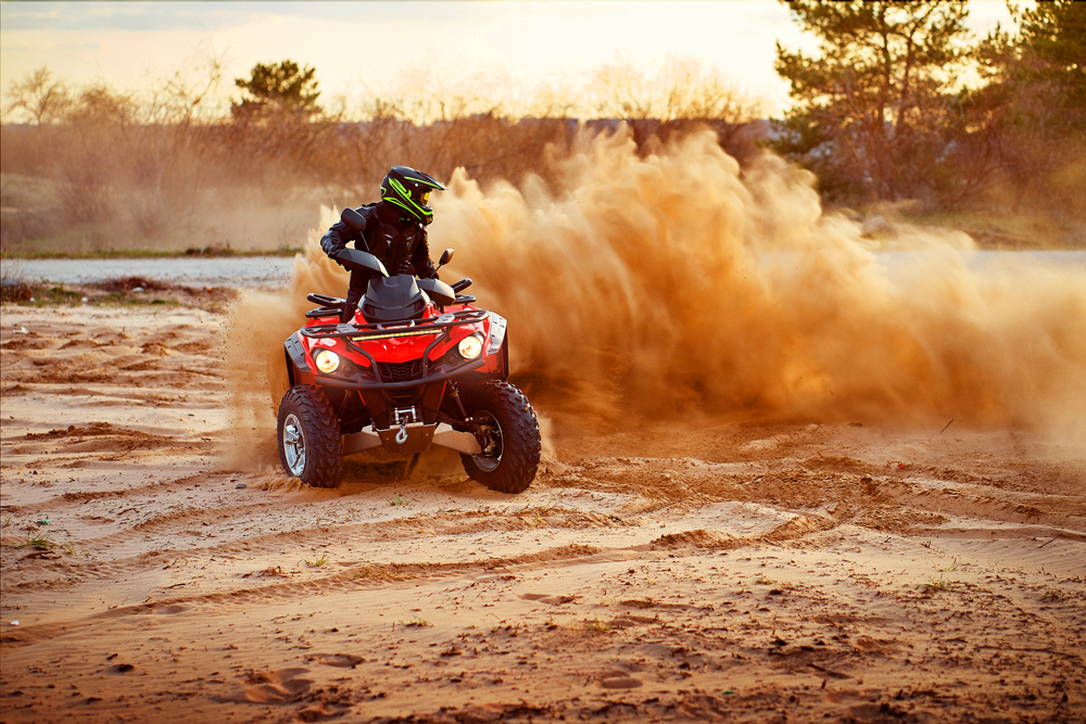 A person riding an ATV