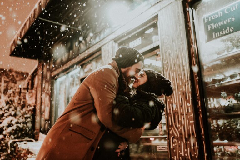 A couple kissing in the snow