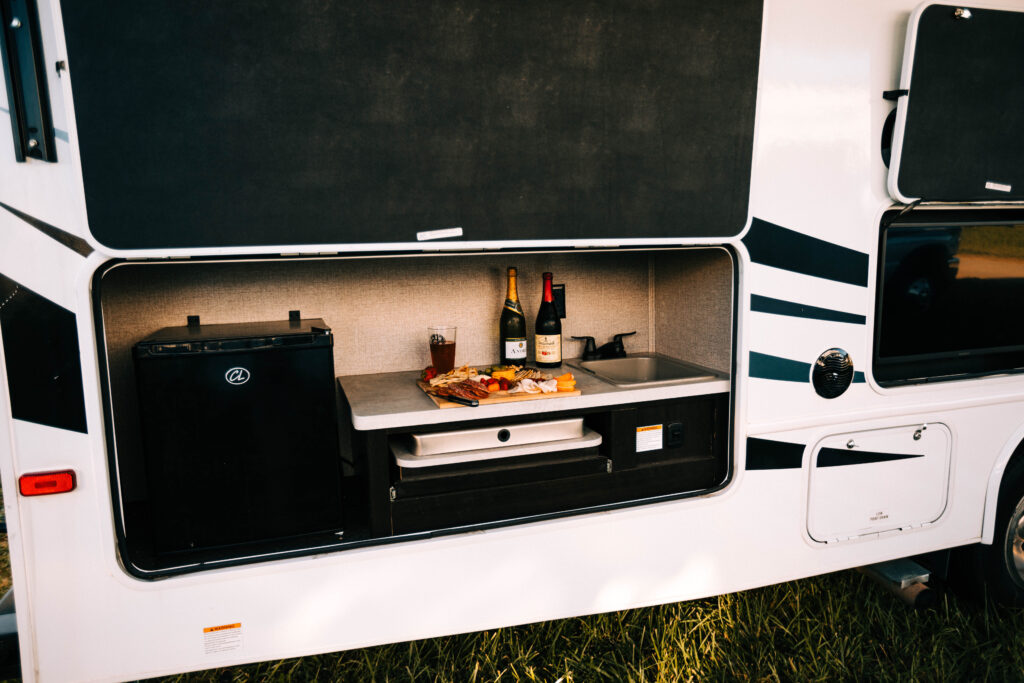 wine and cheese charcuterie in a campervan
