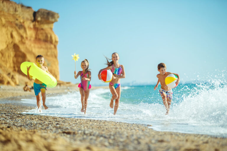 kids running at the beach