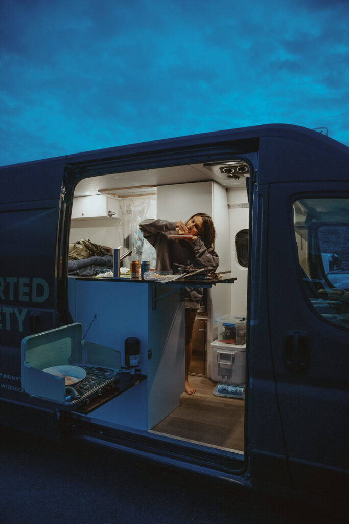 a woman in a campervan