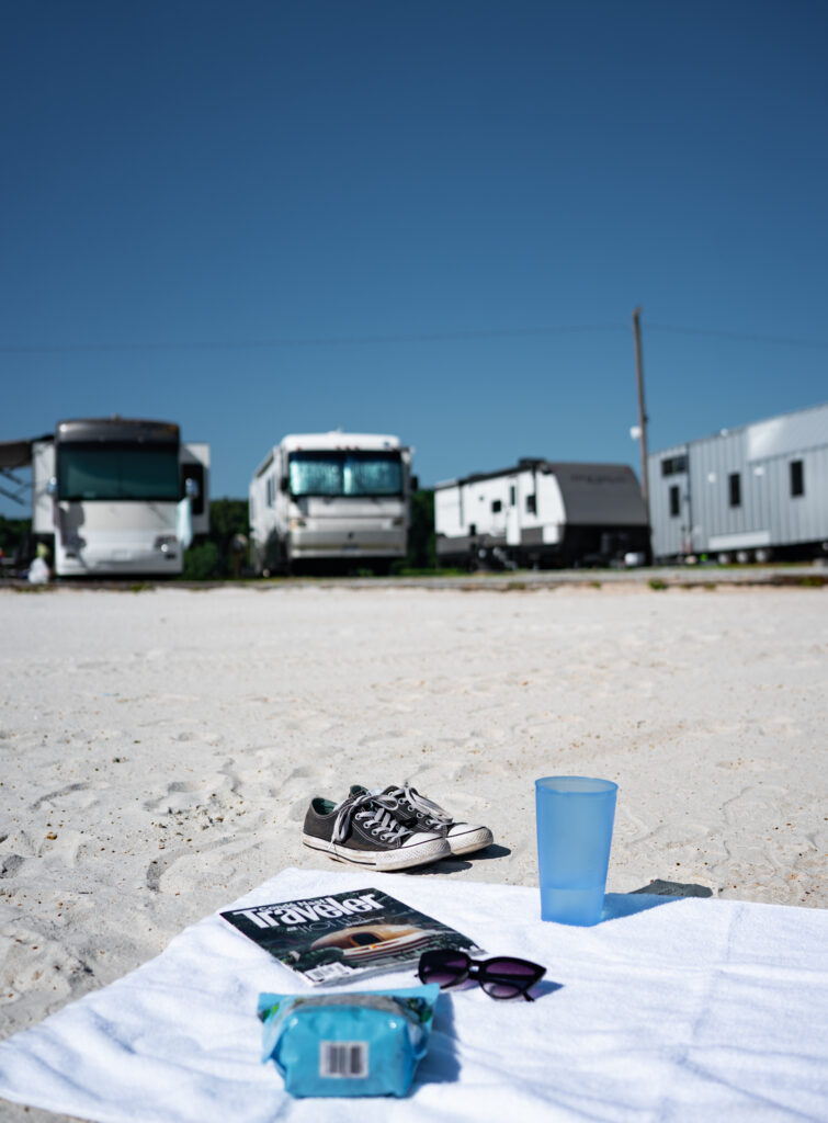 RVs and trailers parked at the beach