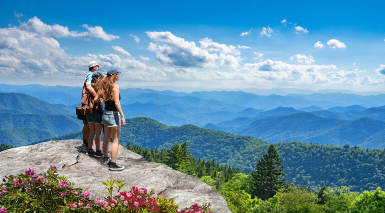 hikers looking out over the Great Smoky Mountains