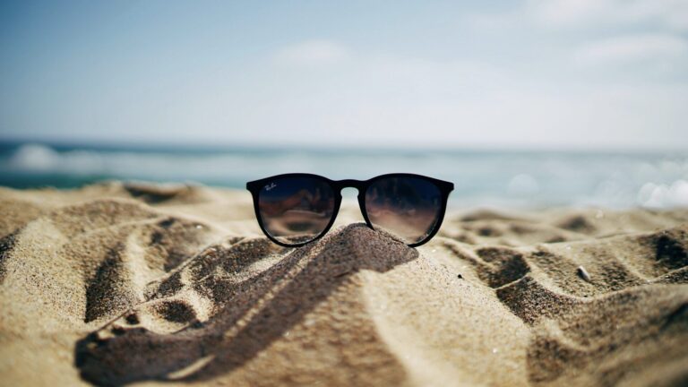 Sunglasses in the sand: an essential piece of summer gear