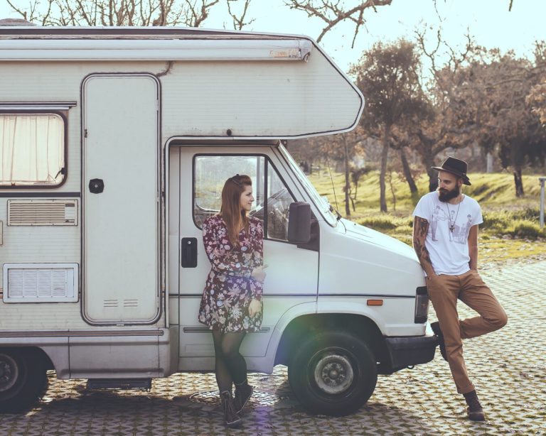 Couple outside of their RV