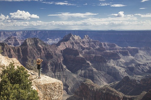 woman gazing out over Grand Canyon National Park