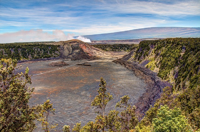 smoke rises from Kilauea Iki Crater at Hawaii Volcanoes National Park