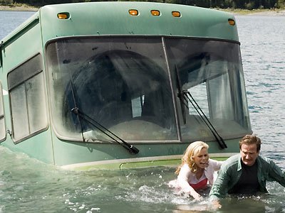 Still frame from the movie RV - the RV has rolled into the lake
