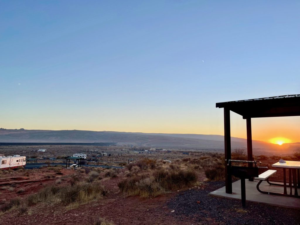 distant view of an RV campsite at sunset