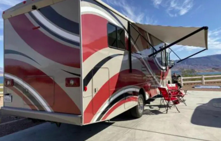 2015 Winnebago Sunstar 31KB set up at a campsite