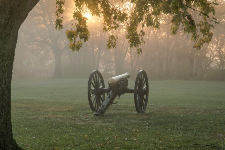 A civil war cannon is in misty light early morning at the Monocacy National Battlefield near Frederick maryland
