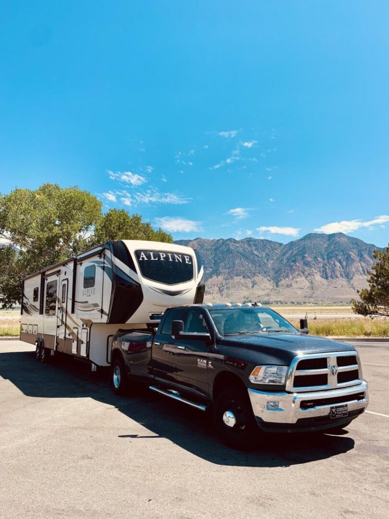 Fifth-wheel RV trailer attached to truck