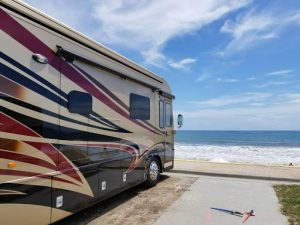 Class A RV parked at the beach Soulful RV Family