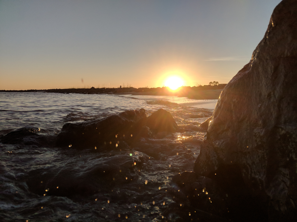 Dauphin Island East End Beach on Dauphin Island, Alabama at sunset.