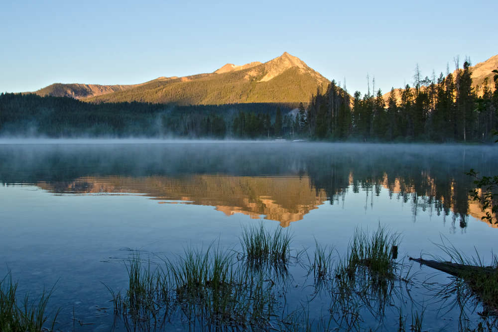 morning light on McDonald Peak reflecting in Pettit Lake near Stanley, Idaho