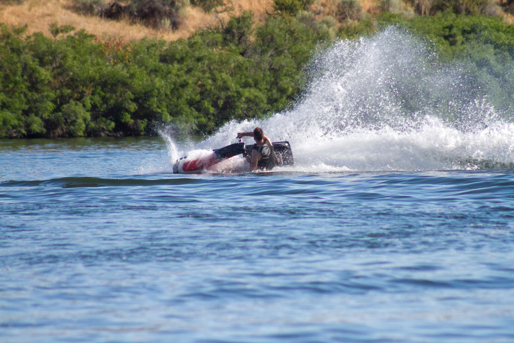 Stand Up Jet Ski fun on a hot summer day. Located at Black's Creek in Emmett, Idaho.