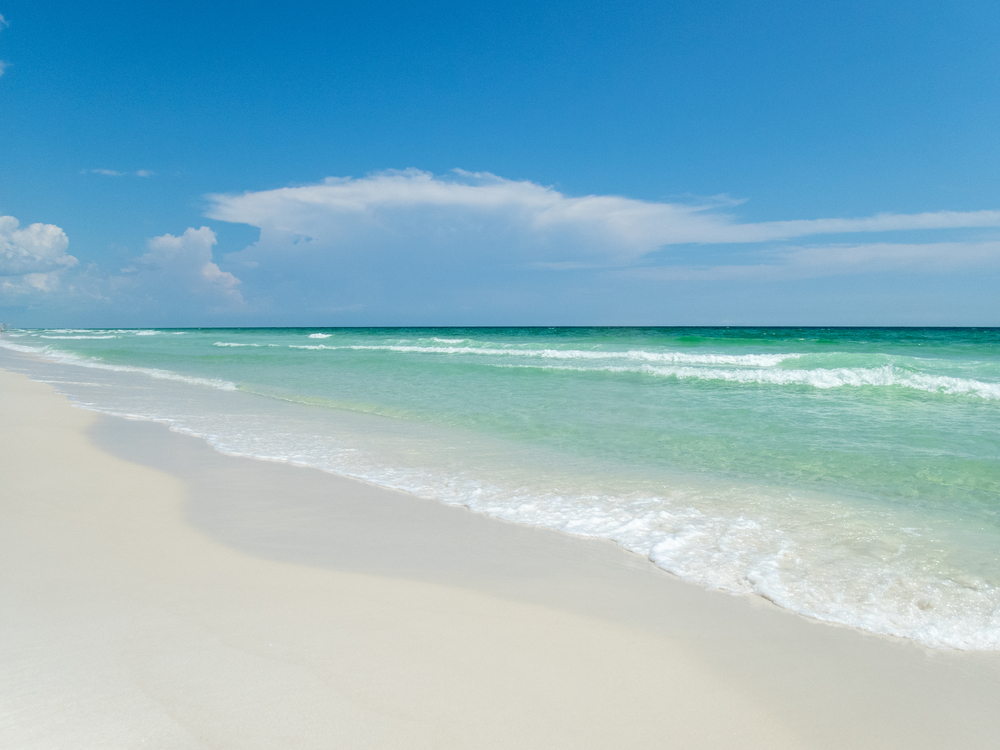 Blue skies, white sands and green waters on Florida’s Emerald Coast near Henderson Beach State Park and Destin Florida