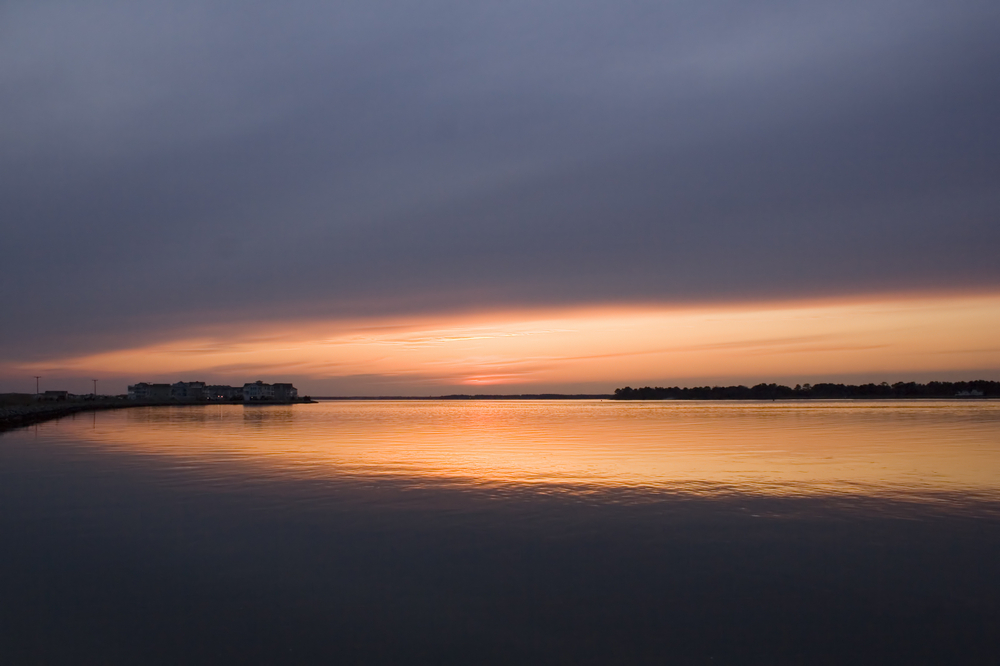 Golden sunset at Indian River Inlet in Delaware.