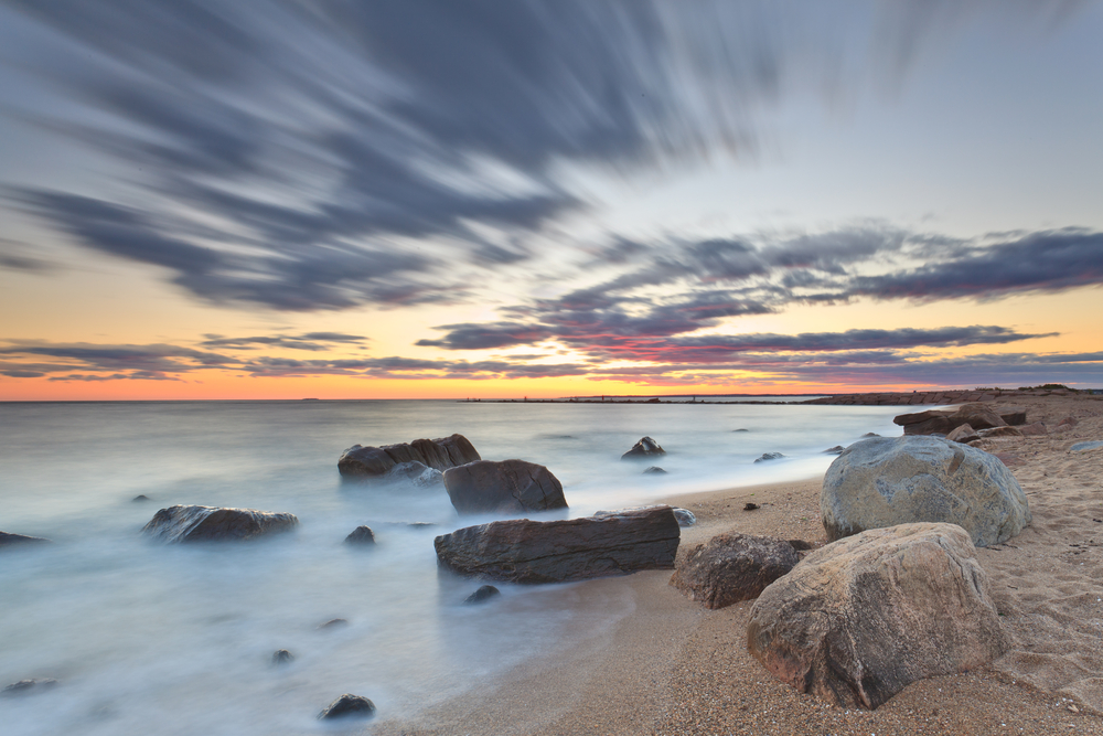 Dusk at a Rocky Beach in Hammonasset State Park located in the county of Madison, Connecticut