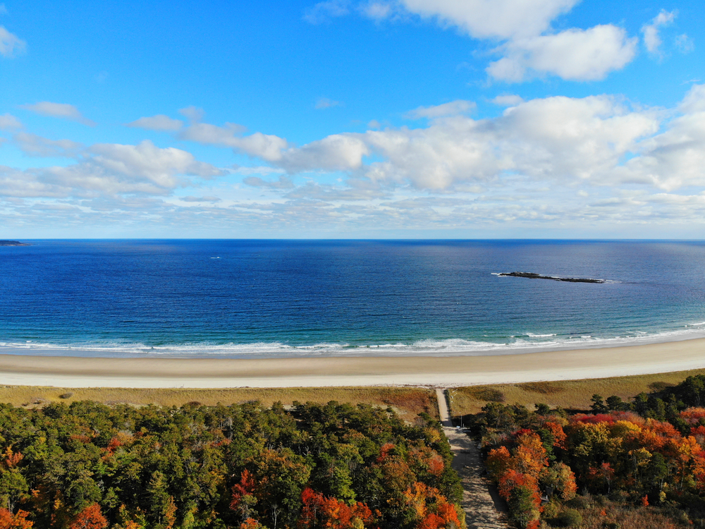 Aerial view of colorful autumn foliage over the Scarborough Beach State Park near Portland, Maine, United States