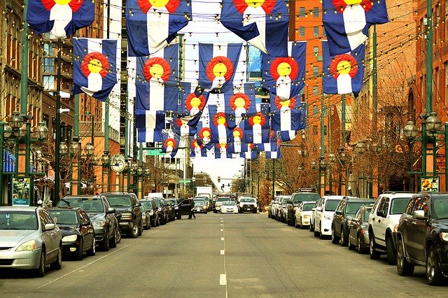 Colorado state flags decorate Larimer Street