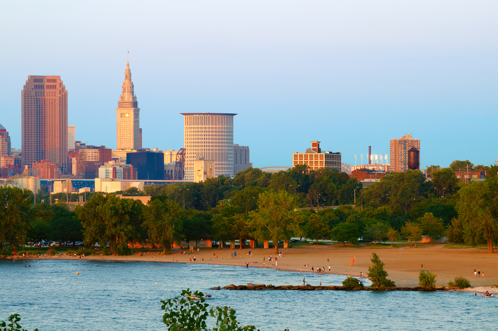 City of Cleveland, Ohio, and beach at Edgewater State Park at sunset