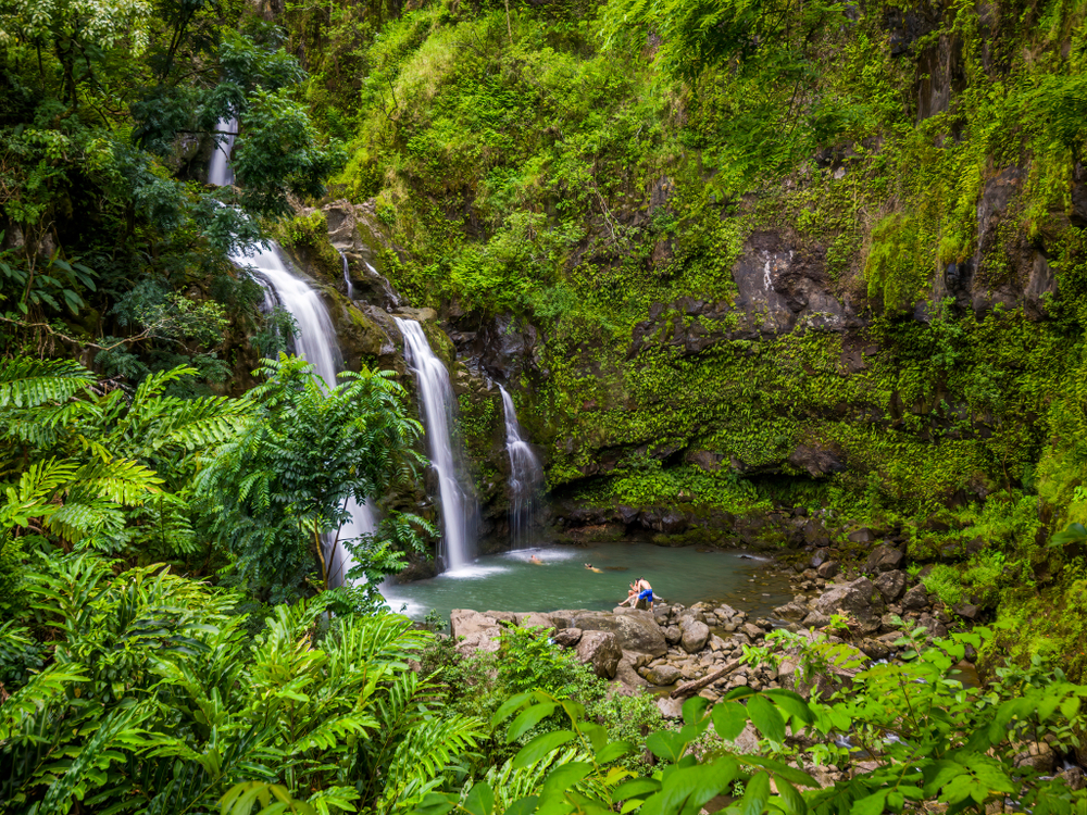 Maui, Hawaii Hana Highway - Three Bears Falls, Upper Waikani Falls. Road to Hana connects Kahului to the town of Hana Over 59 bridges, 620 curves, tropical rainforest.