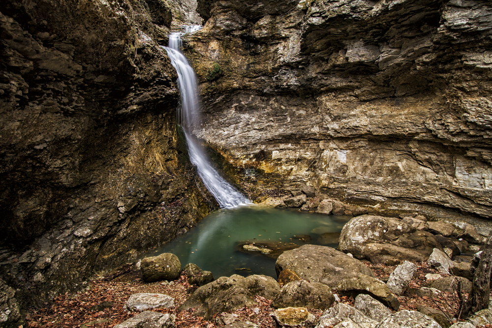 A horizontal image of Eden Falls in Arkansas. It is just one of several waterfalls in Arkansas.