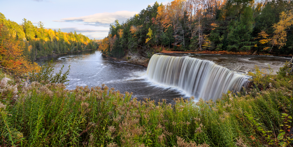 A panoramic view of the very picturesque Tahquamenon Falls and Tahquamenon River during Autumn, Upper Peninsula, Michigan, USA