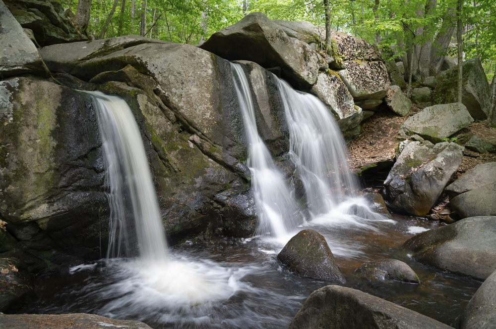 Cascading waterfalls at Trap Falls in the Willard Brook State Forest, in Townsend, Massachusetts. A favorite New England attraction.