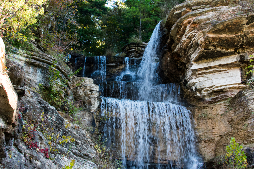 Waterfall in dogwood canyon Missouri during the fall.