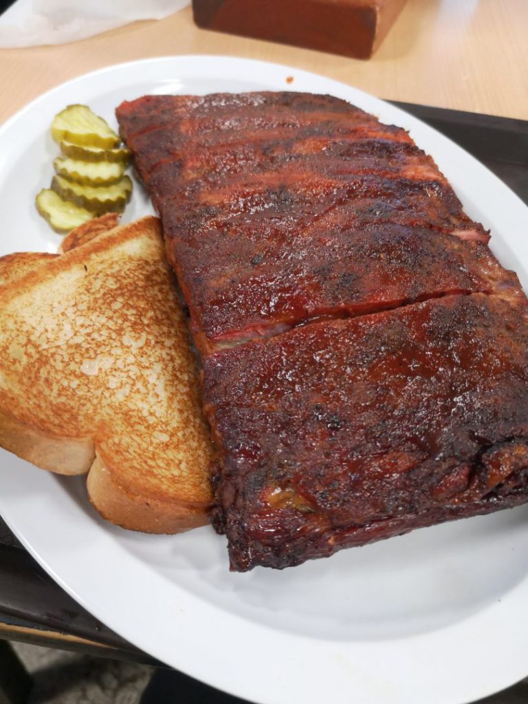 Plate of BBQ ribs and toast