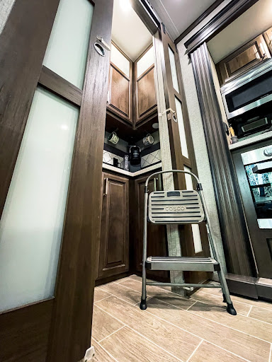 Step stool in the corner of an RV kitchen