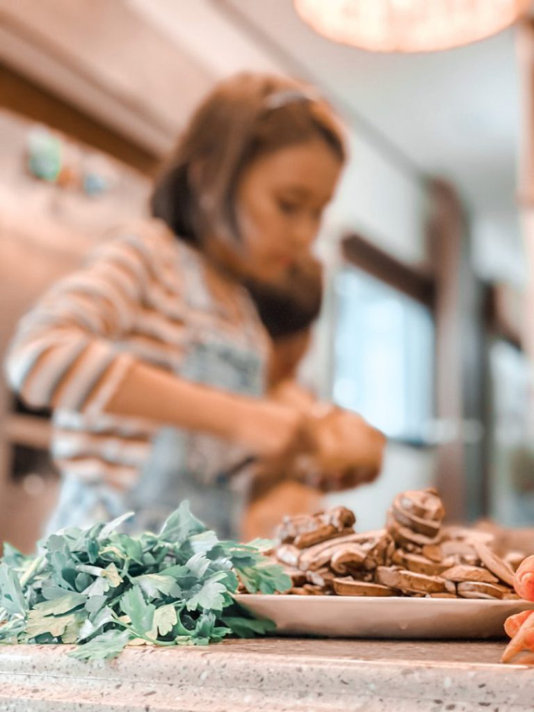 Kids help prepare vegan dinner