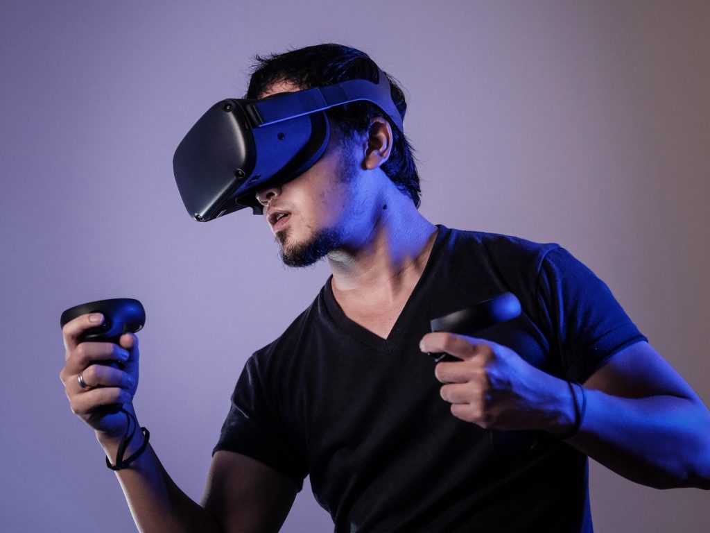 Man wearing VR headset at amusement center