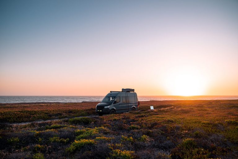 rv parked at sunset