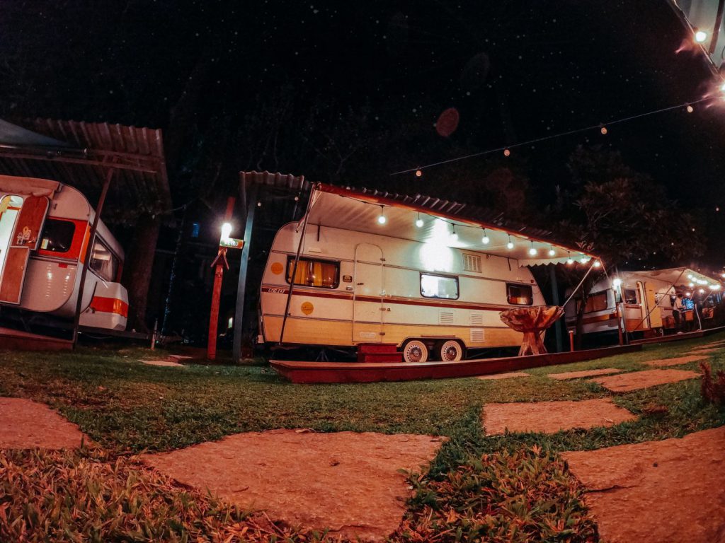 a retro camping trailer with twinkle lights