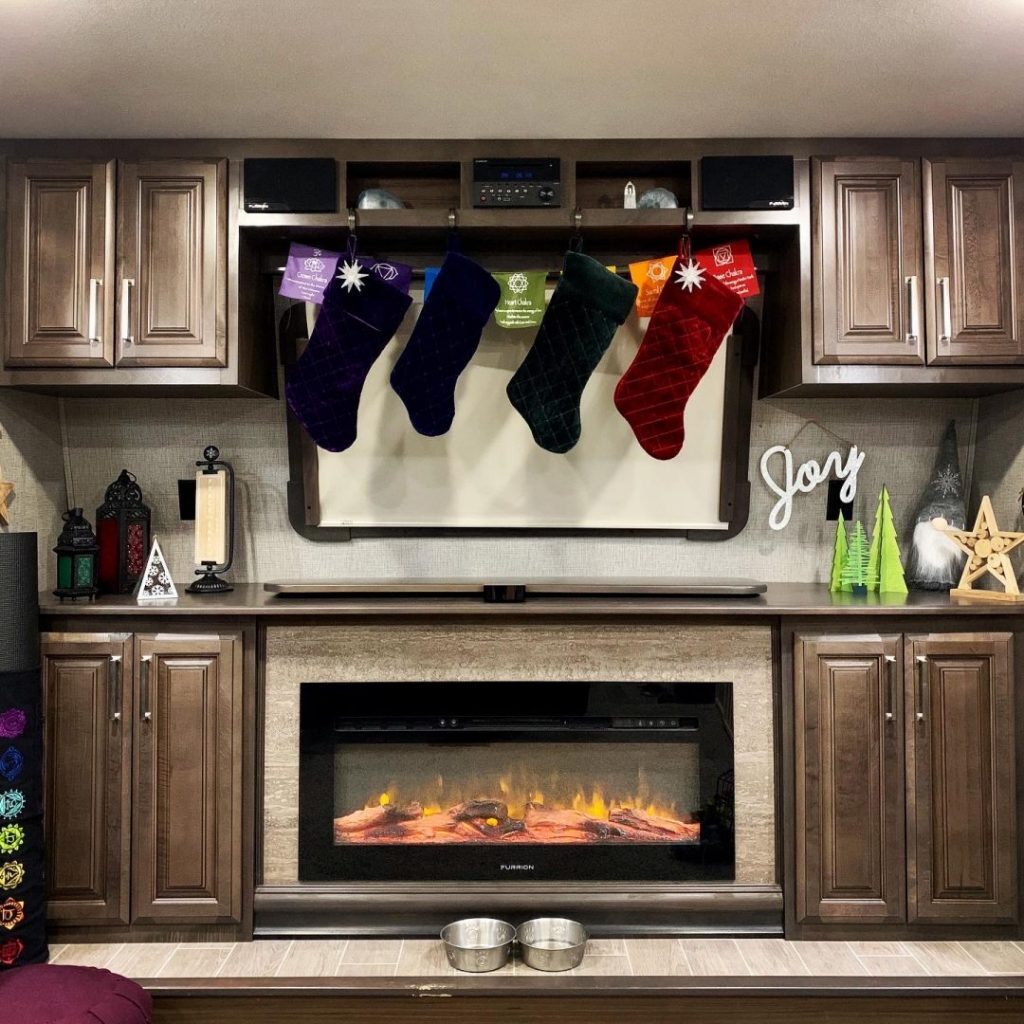 colorful stockings over the fireplace of an rv