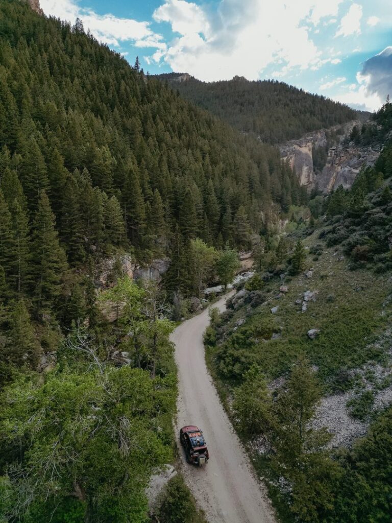 View into car driving through Crazy Woman Canyon