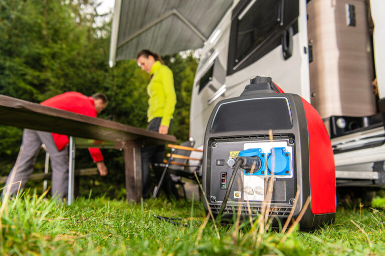 An RV generator with motorhome in the background