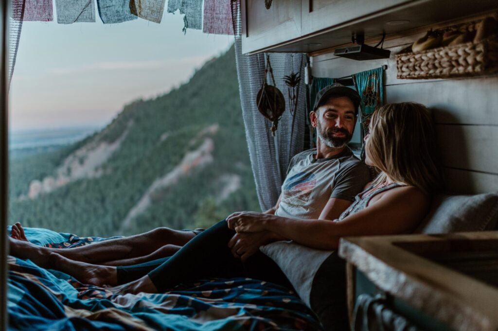 couple inside converted van
