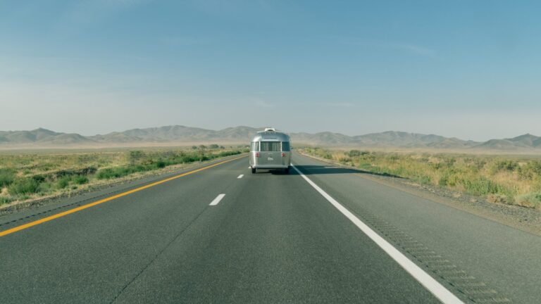 RV driving down the road. What happens after I book my RV?